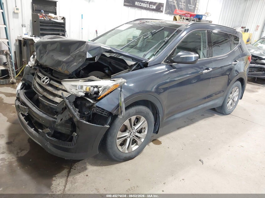 2014 Hyundai Santa fe VIN 5XYZU3LB2EG155239 IAAI salvage auction — FRONT END, Prior Salvage (Minnesota), sold $675 on 2026-07-24 (photo 2)