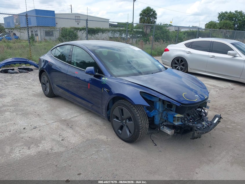 2021 Tesla Model 3 VIN 5YJ3E1EB2MF862111 — IAAI salvage auction photo