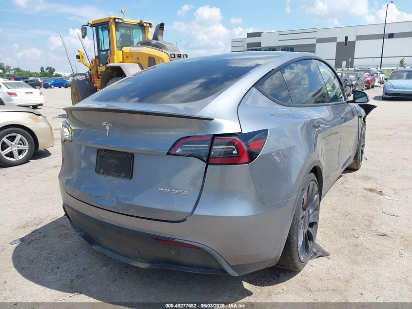 2024 Tesla Model y VIN 7SAYGDEFXRA327636 IAAI salvage auction — FRONT & REAR, Salvage Title, sold $11,975 on 2026-08-27 (photo 4)