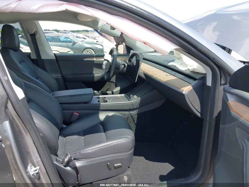2024 Tesla Model y VIN 7SAYGDEFXRA327636 IAAI salvage auction — FRONT & REAR, Salvage Title, sold $11,975 on 2026-08-27 (photo 5)