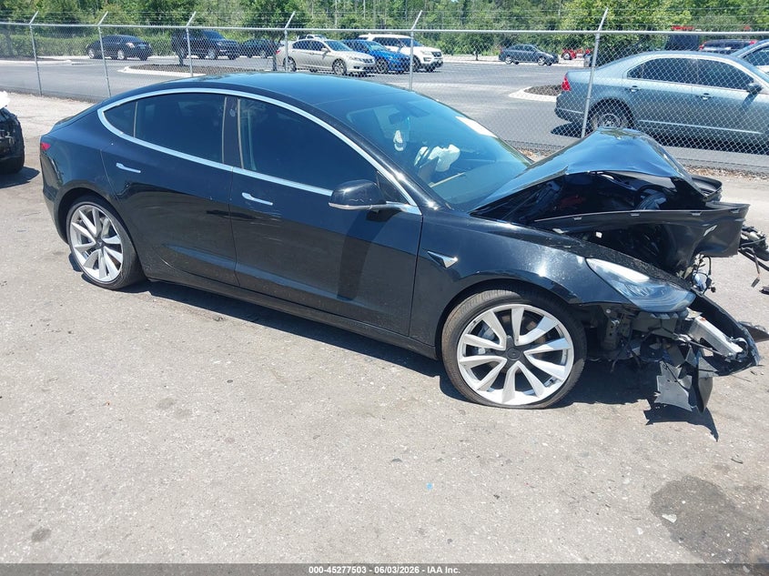 2019 Tesla Model 3 VIN 5YJ3E1EA5KF401778 IAAI salvage auction — UNKNOWN, Rebuildable (Florida), sold $2,900 on 2026-07-30 (photo 1)