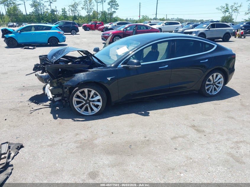 2019 Tesla Model 3 VIN 5YJ3E1EA5KF401778 IAAI salvage auction — UNKNOWN, Rebuildable (Florida), sold $2,900 on 2026-07-30 (photo 2)