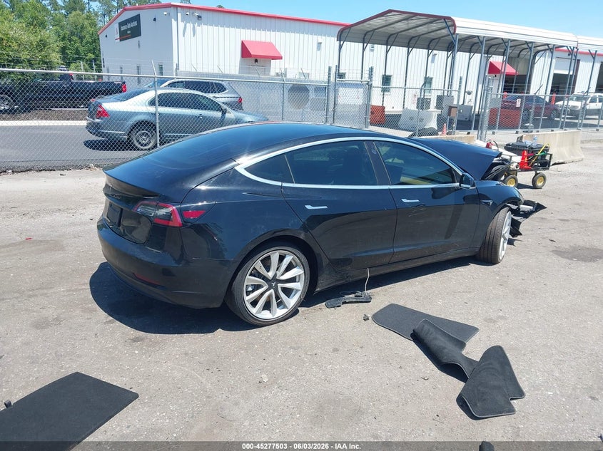 2019 Tesla Model 3 VIN 5YJ3E1EA5KF401778 IAAI salvage auction — UNKNOWN, Rebuildable (Florida), sold $2,900 on 2026-07-30 (photo 4)