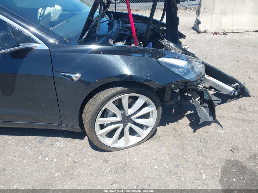 2019 Tesla Model 3 VIN 5YJ3E1EA5KF401778 IAAI salvage auction — UNKNOWN, Rebuildable (Florida), sold $2,900 on 2026-07-30 (photo 6)