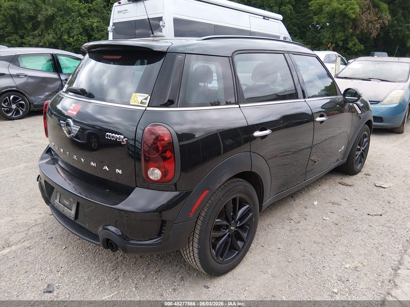 2014 Mini Countryman VIN WMWZC5C59EWP41428 IAAI salvage auction — WATER/FLOOD, Salvage Title, sold $600 on 2026-07-29 (photo 4)