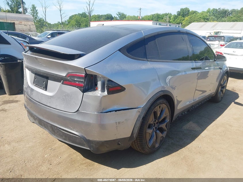 2026 Tesla Model x VIN 7SAXCBE58TF481775 IAAI salvage auction — LEFT SIDE, Salvage - 75% Or Less (Maryland), sold $33,500 on 2026-07-09 (photo 4)
