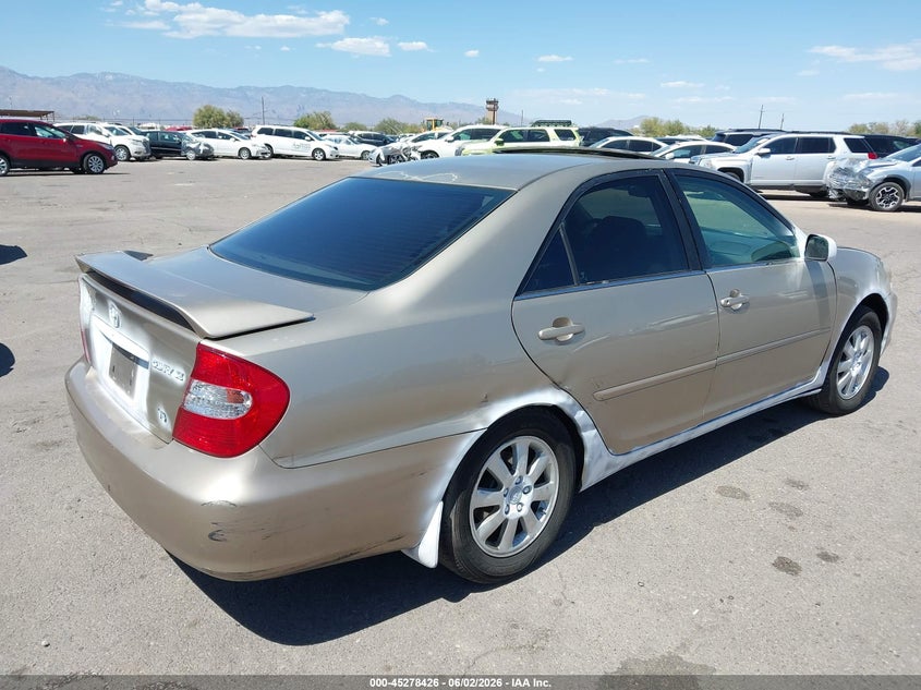 2002 Toyota Camry VIN 4T1BF30K32U504561 IAAI salvage auction — THEFT, Salvage (Arizona), sold $1,050 on 2026-07-09 (photo 4)