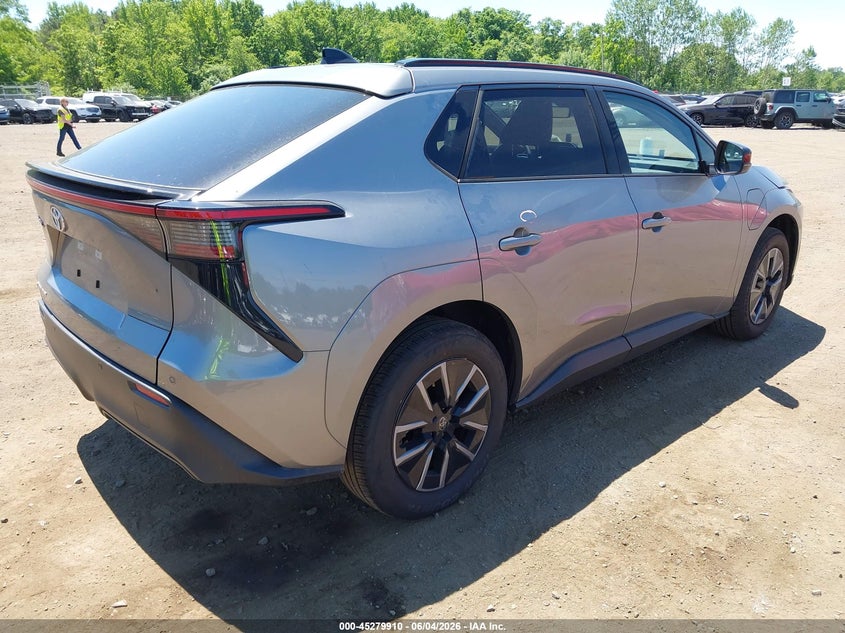 2026 Toyota Bz4x VIN JTMBDAFB6TA006055 IAAI salvage auction — SIDE, Salvage Title, sold $16,600 on 2026-07-29 (photo 4)