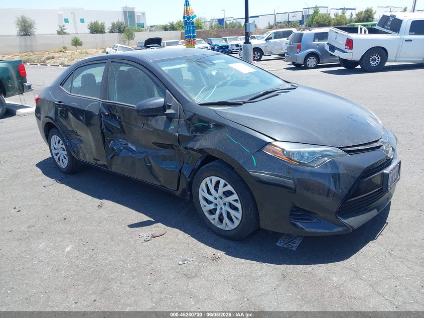 2018 Toyota Corolla VIN 5YFBURHE2JP854223 IAAI salvage auction — SIDE, Salvage Title, sold $3,500 on 2026-07-12 (photo 1)