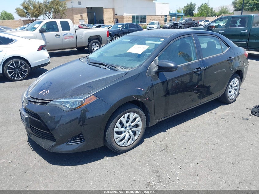 2018 Toyota Corolla VIN 5YFBURHE2JP854223 IAAI salvage auction — SIDE, Salvage Title, sold $3,500 on 2026-07-12 (photo 2)