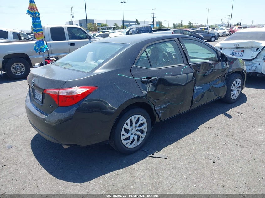 2018 Toyota Corolla VIN 5YFBURHE2JP854223 IAAI salvage auction — SIDE, Salvage Title, sold $3,500 on 2026-07-12 (photo 4)