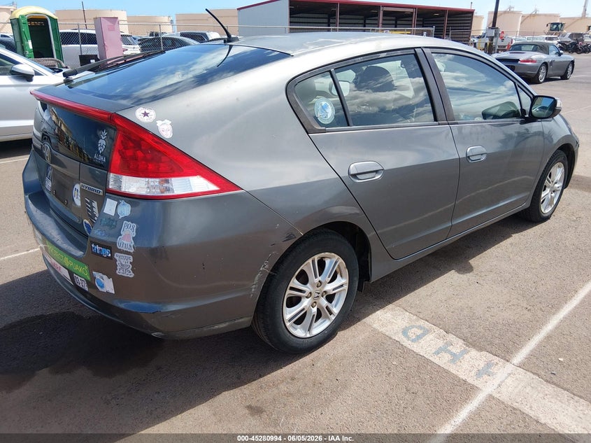 2011 Honda Insight VIN JHMZE2H70BS010572 IAAI salvage auction — NORMAL WEAR, Clear (Hawaii), sold $25 on 2026-07-28 (photo 4)