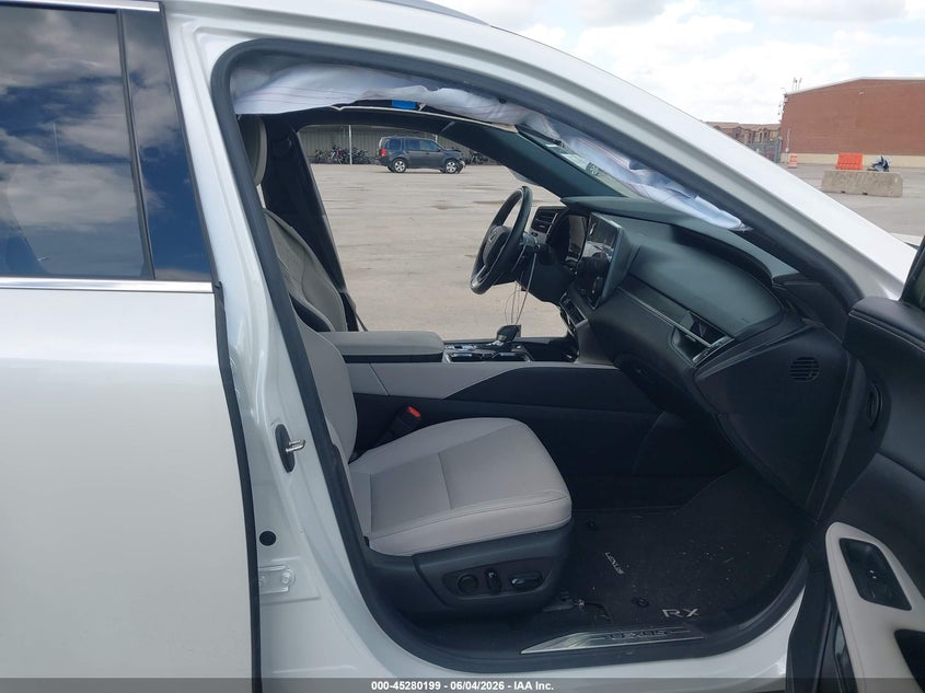 2023 Lexus Rx VIN JTJCHMAA8P2001168 IAAI salvage auction — SIDE, Original (Texas), sold $19,300 on 2026-07-17 (photo 5)