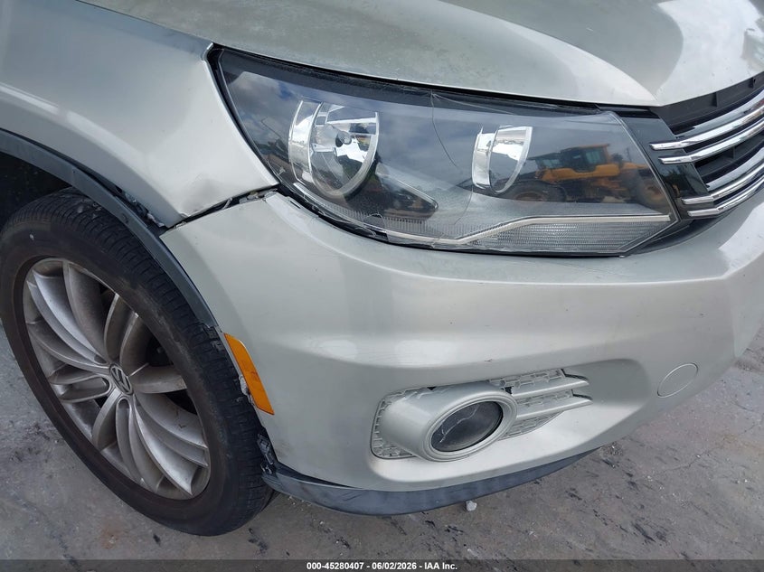 2012 Volkswagen Tiguan VIN WVGAV7AX6CW519934 IAAI salvage auction — NORMAL WEAR, Clear (Florida), sold $475 on 2026-07-07 (photo 6)