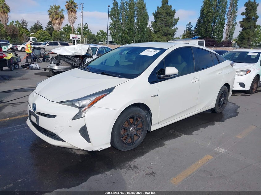 2017 Toyota Prius VIN JTDKBRFU4H3566450 IAAI salvage auction — NORMAL WEAR, Salvage Title, sold $3,850 on 2026-07-13 (photo 2)
