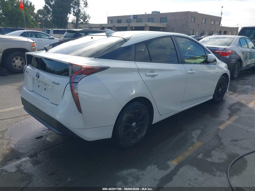 2017 Toyota Prius VIN JTDKBRFU4H3566450 IAAI salvage auction — NORMAL WEAR, Salvage Title, sold $3,850 on 2026-07-13 (photo 4)