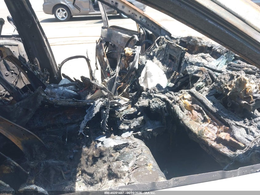 2024 Toyota Rav 4 VIN JTMMWRFV7RD231295 IAAI salvage auction — TOTAL BURN, Salvage Title, sold $25 on 2026-07-24 (photo 5)