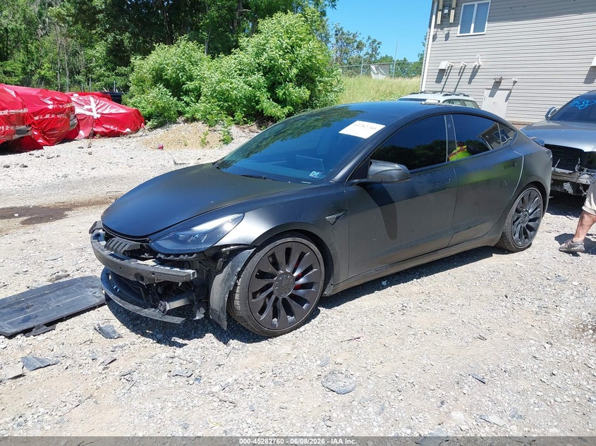 2023 Tesla Model 3 VIN 5YJ3E1EC7PF687500 IAAI salvage auction — FRONT END, Salvage Title, sold $525 on 2026-07-21 (photo 2)