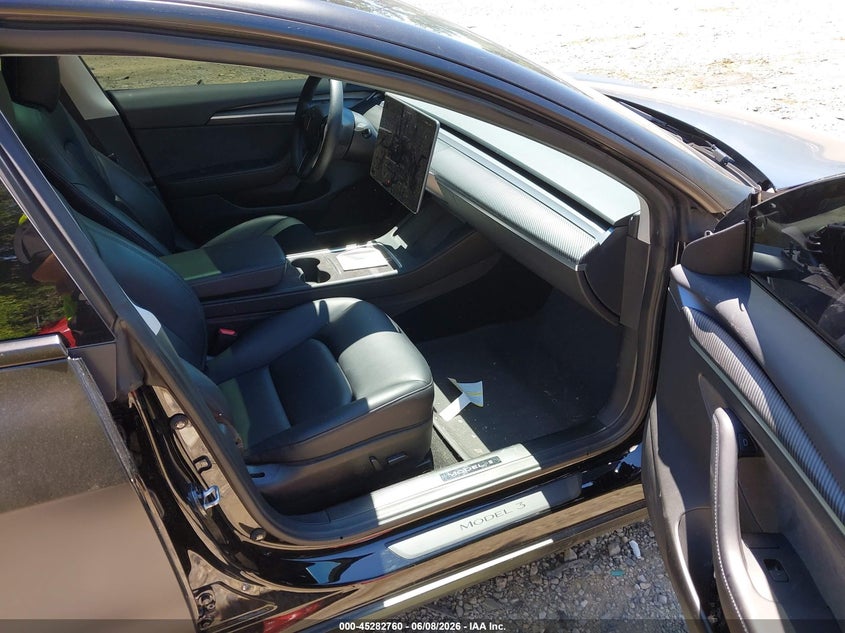 2023 Tesla Model 3 VIN 5YJ3E1EC7PF687500 IAAI salvage auction — FRONT END, Salvage Title, sold $525 on 2026-07-21 (photo 5)