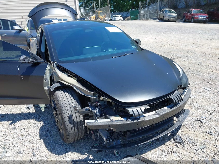 2023 Tesla Model 3 VIN 5YJ3E1EC7PF687500 IAAI salvage auction — FRONT END, Salvage Title, sold $525 on 2026-07-21 (photo 6)