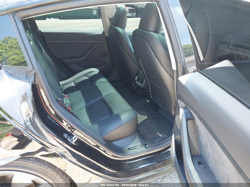 2023 Tesla Model 3 VIN 5YJ3E1EC7PF687500 IAAI salvage auction — FRONT END, Salvage Title, sold $525 on 2026-07-21 (photo 8)