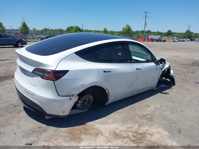 2022 Tesla Model y VIN 7SAYGDEE4NF440065 IAAI salvage auction — LEFT & RIGHT, Salvage Title, sold $7,975 on 2026-07-30 (photo 4)