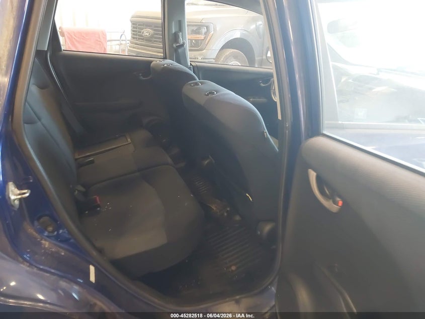 2009 Honda Fit VIN JHMGE88439S049053 IAAI salvage auction — FRONT END, Clear (Michigan), sold $425 on 2026-07-07 (photo 8)