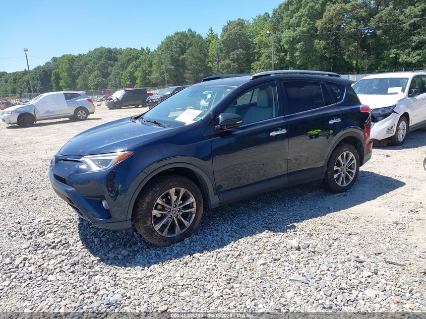 2018 Toyota Rav 4 VIN JTMYFREV2JD131192 IAAI salvage auction — RIGHT SIDE, Salvage Title, sold $6,600 on 2026-07-16 (photo 2)