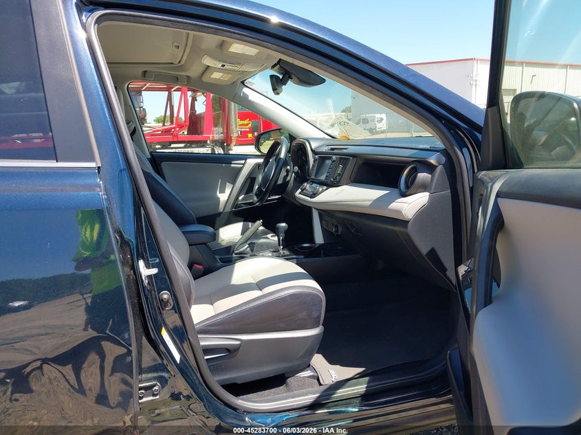 2018 Toyota Rav 4 VIN JTMYFREV2JD131192 IAAI salvage auction — RIGHT SIDE, Salvage Title, sold $6,600 on 2026-07-16 (photo 5)