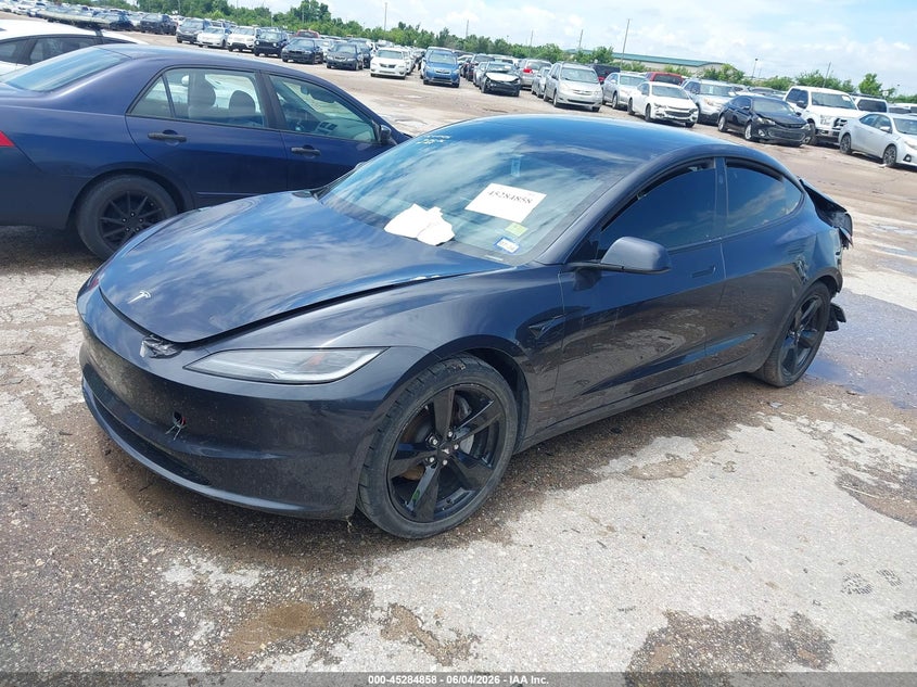 2025 Tesla Model 3 VIN 5YJ3E1EAXSF021917 IAAI salvage auction — REAR END, Salvage Title, sold $10,000 on 2026-07-15 (photo 2)