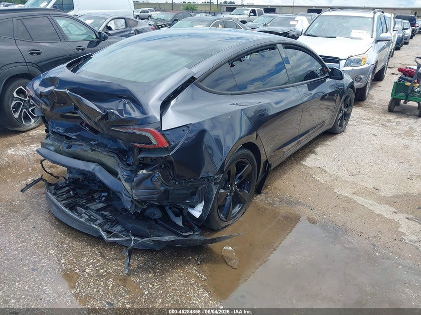 2025 Tesla Model 3 VIN 5YJ3E1EAXSF021917 IAAI salvage auction — REAR END, Salvage Title, sold $10,000 on 2026-07-15 (photo 4)