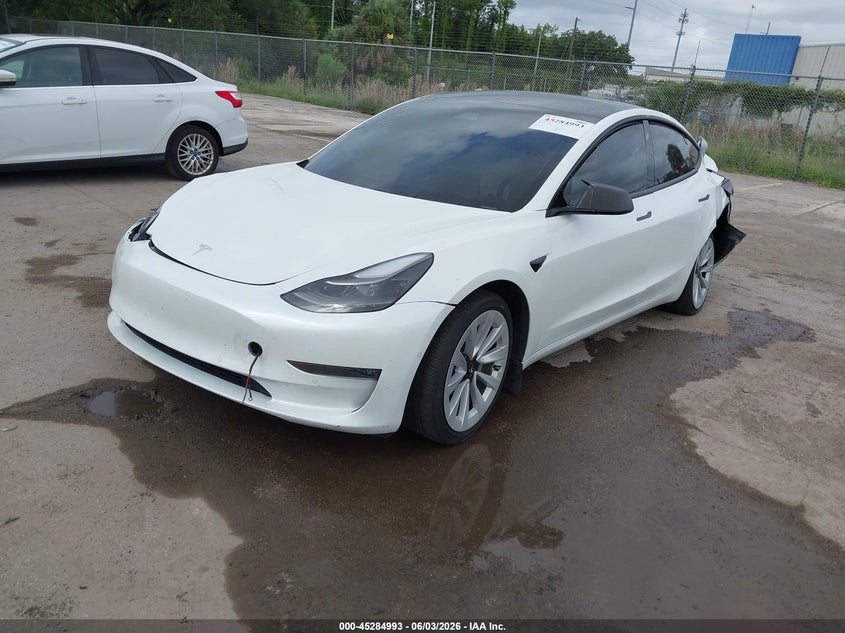 2022 Tesla Model 3 VIN 5YJ3E1EB7NF103763 IAAI salvage auction — ALL OVER, Salvage Title, sold $4,900 on 2026-07-09 (photo 2)