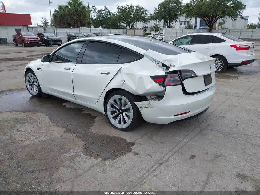 2022 Tesla Model 3 VIN 5YJ3E1EB7NF103763 IAAI salvage auction — ALL OVER, Salvage Title, sold $4,900 on 2026-07-09 (photo 3)