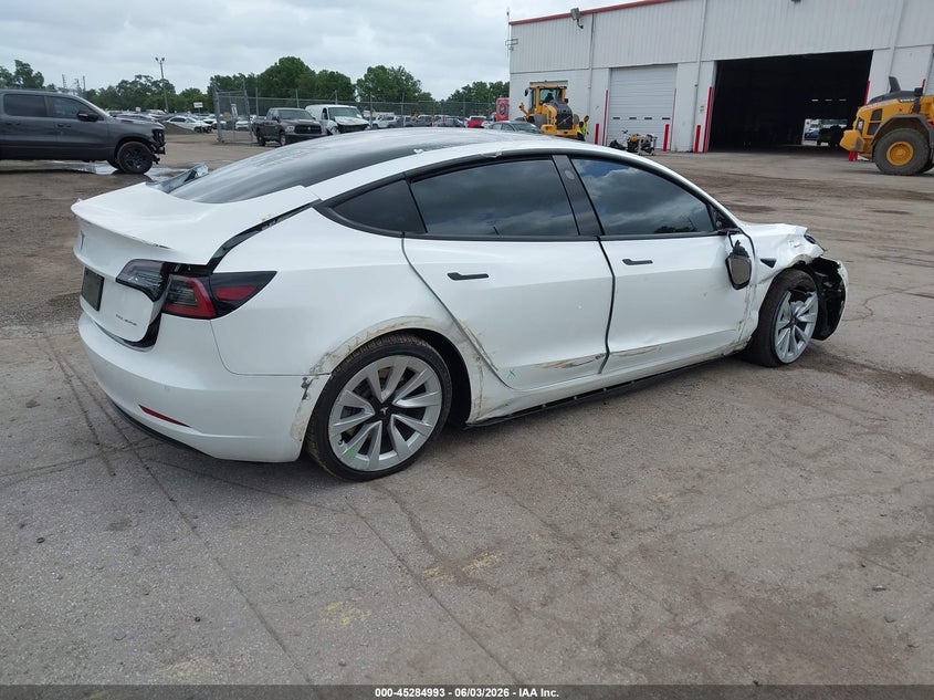 2022 Tesla Model 3 VIN 5YJ3E1EB7NF103763 IAAI salvage auction — ALL OVER, Salvage Title, sold $4,900 on 2026-07-09 (photo 4)