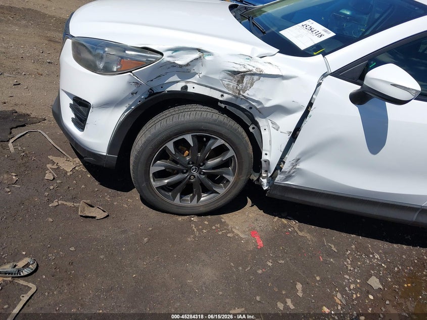 2016 Mazda Cx-5 VIN JM3KE4DY5G0705475 IAAI salvage auction — MECHANICAL, Salvage Title, sold $275 on 2026-07-21 (photo 6)