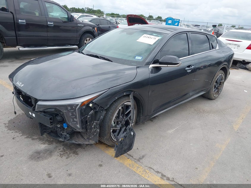 2025 Kia K4 VIN 3KPFW4DE0SE078441 IAAI salvage auction — SIDE, Salvage Title, sold $7,500 on 2026-08-20 (photo 2)