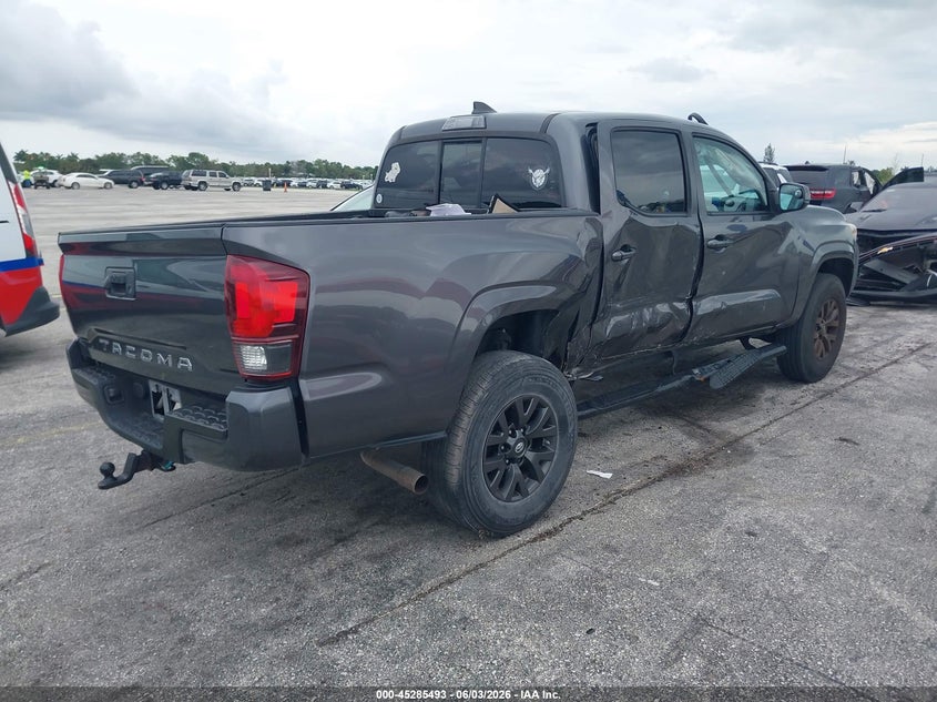 2019 Toyota Tacoma VIN 5TFAX5GN7KX156514 IAAI salvage auction — SIDE, Salvage Title, sold $5,900 on 2026-07-23 (photo 4)