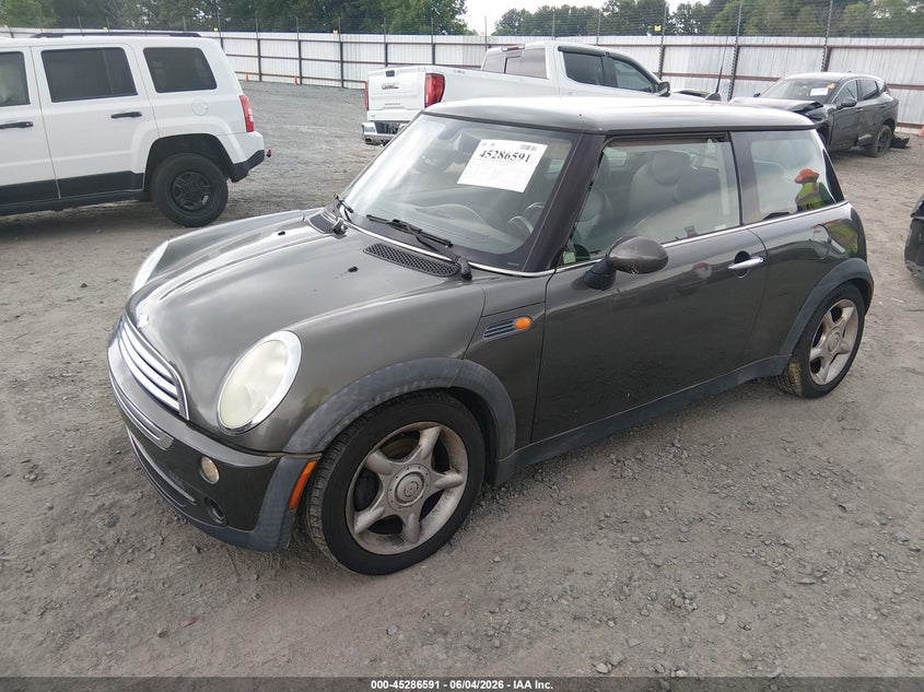 2006 Mini Cooper VIN WMWRC33546TJ73760 IAAI salvage auction — NORMAL WEAR, Clear (Florida), sold $650 on 2026-08-05 (photo 2)