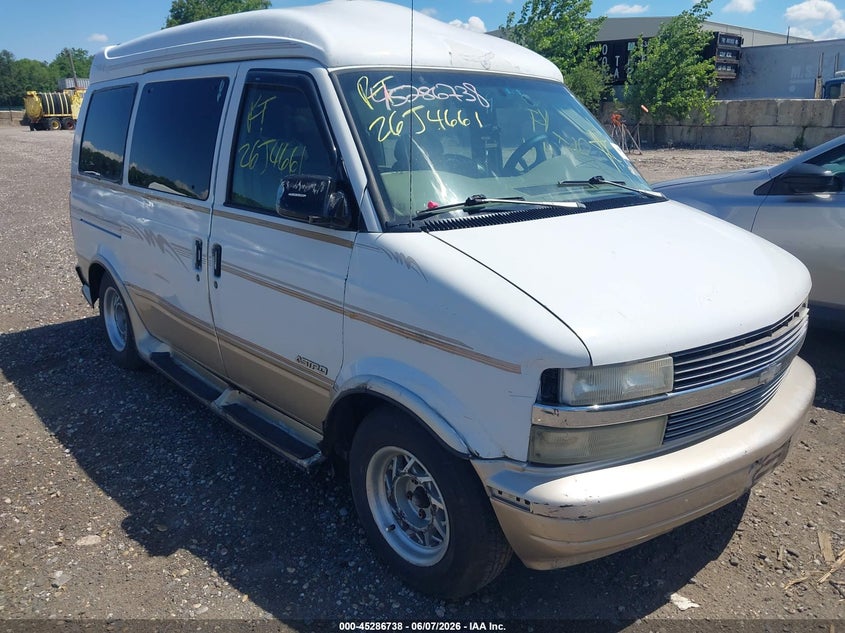 1999 Chevrolet Astro VIN 1GBDM19W7XB112638 — IAAI salvage auction photo
