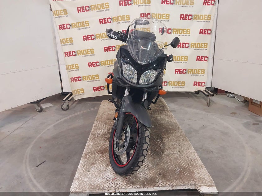 2012 Suzuki VIN JS1VP56A5C2104145 IAAI salvage auction — LEFT SIDE, Wait Title, sold $0 on 2026-09-16 (photo 5)