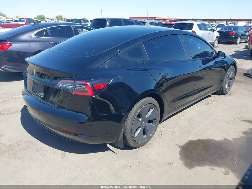 2022 Tesla Model 3 VIN 5YJ3E1EA9NF373097 IAAI salvage auction — SIDE, Salvage Title, sold $7,350 on 2026-07-14 (photo 4)