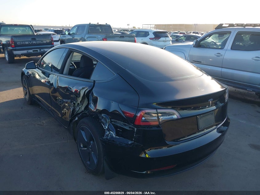 2022 Tesla Model 3 VIN 5YJ3E1EA9NF373097 IAAI salvage auction — SIDE, Salvage Title, sold $7,350 on 2026-07-14 (photo 3)