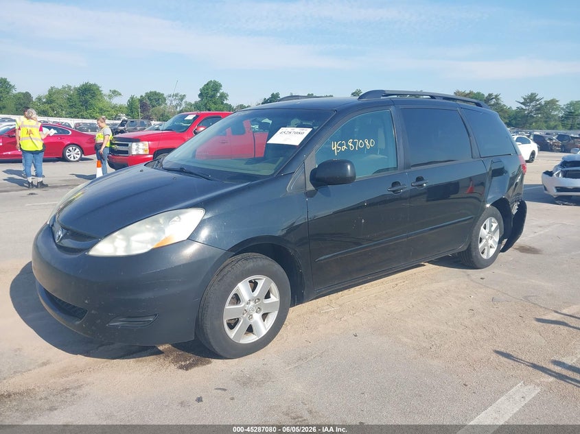 2010 Toyota Sienna VIN 5TDKK4CCXAS329903 IAAI salvage auction — REAR END, Clear (Indiana), sold $975 on 2026-07-17 (photo 2)