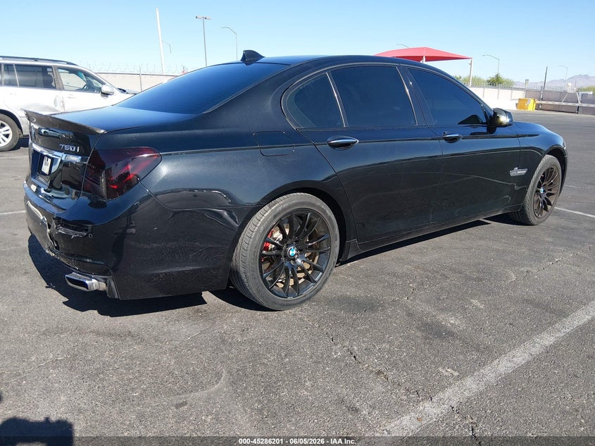 2012 BMW 7er VIN WBAKC6C53CC397276 IAAI salvage auction — REAR END, Salvage Title, sold $1,450 on 2026-07-24 (photo 4)