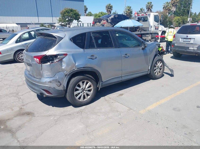 2013 Mazda Cx-5 VIN JM3KE2CE5D0102906 IAAI salvage auction — RIGHT FRONT, Salvage Title, sold $1,150 on 2026-07-13 (photo 4)
