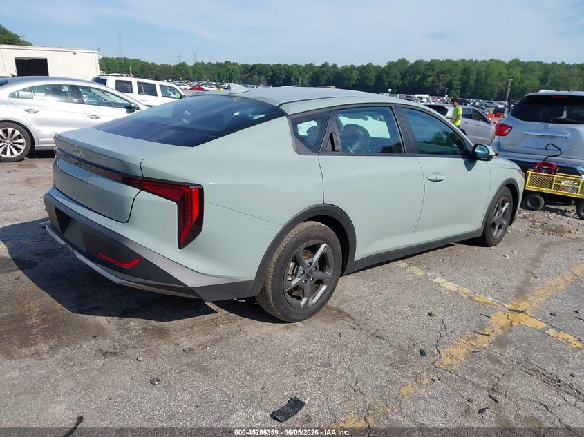 2025 Kia K4 VIN 3KPFT4DE8SE226537 IAAI salvage auction — SIDE, Salvage Title, sold $7,800 on 2026-08-24 (photo 4)