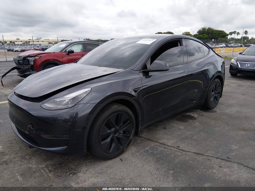 2024 Tesla Model y VIN 7SAYGDED5RF159714 IAAI salvage auction — REAR END, Salvage Title, sold $13,200 on 2026-07-09 (photo 2)