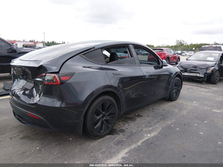 2024 Tesla Model y VIN 7SAYGDED5RF159714 IAAI salvage auction — REAR END, Salvage Title, sold $13,200 on 2026-07-09 (photo 4)