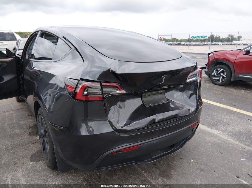 2024 Tesla Model y VIN 7SAYGDED5RF159714 IAAI salvage auction — REAR END, Salvage Title, sold $13,200 on 2026-07-09 (photo 6)