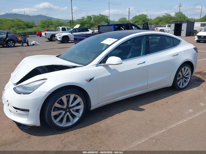 2018 Tesla Model 3 VIN 5YJ3E1EA6JF126470 IAAI salvage auction — NORMAL WEAR, Clear (Hawaii), sold $2,400 on 2026-07-21 (photo 2)